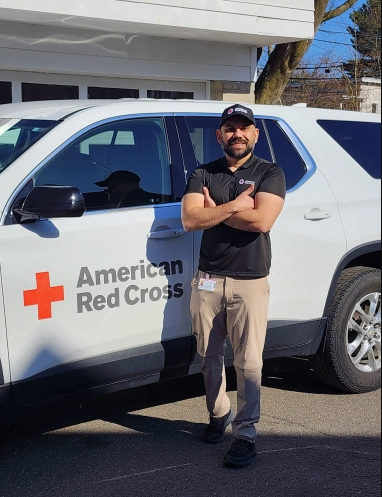 Eli Chavez, Red Cross volunteer smiiling 