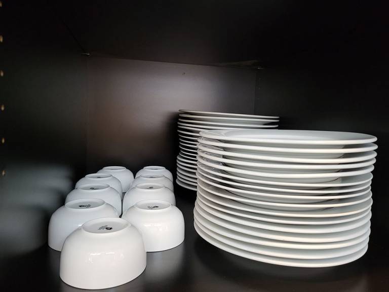 Stack of ceramic plates and bowls