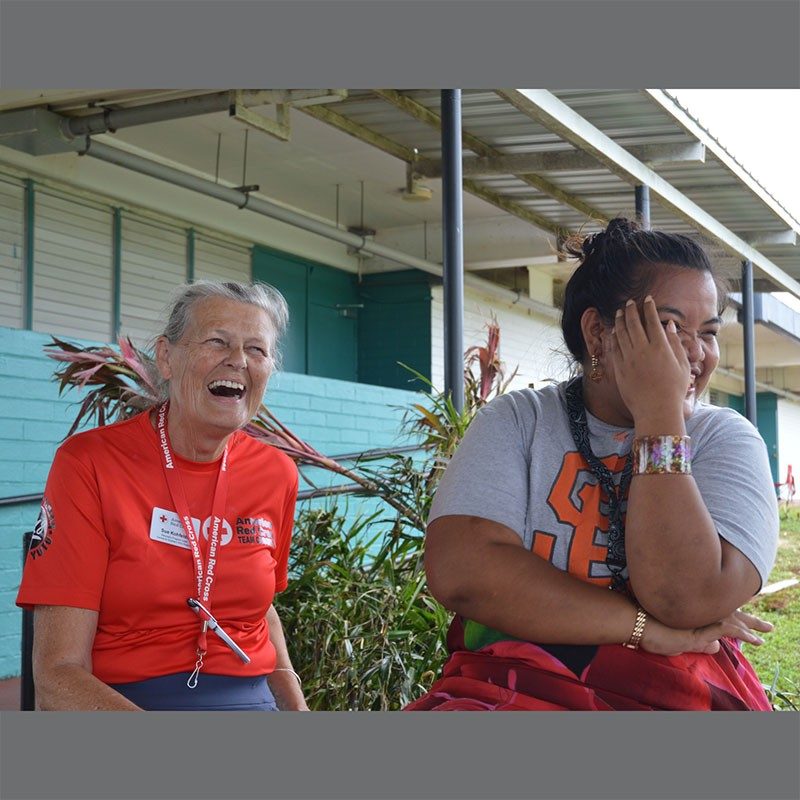 Scave Rukan shares a moment with Red Cross volunteer Sue in Dededo.