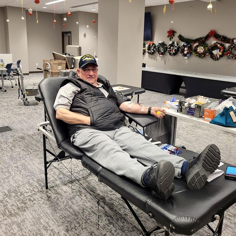 Ed Hartry in cot donating blood