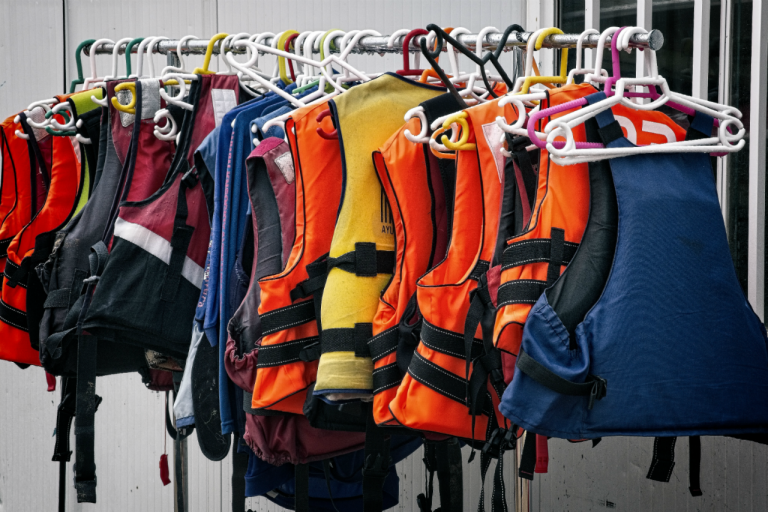 Variety of life jackets hanging up