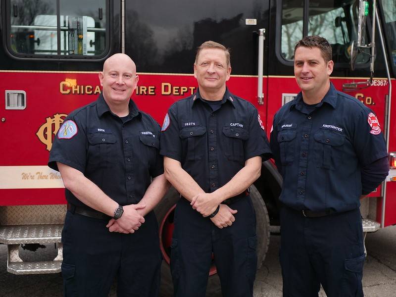 Captain Paul Burns, Firefighter Paramedic Michael Modjeski, Firefighter EMT Jeffrey Rich in front of firetruck