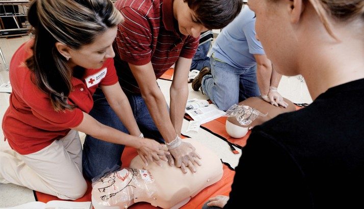 red cross volunteers in cpr training