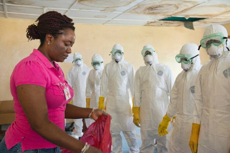 International-Services-Ebola-Africa-Woman-Hazmat-suits