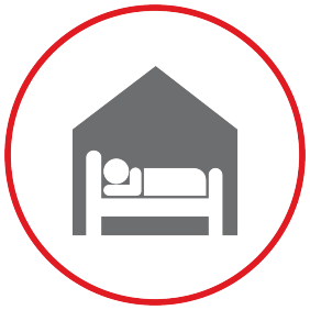 An icon representing a person sleeping in a Red Cross shelter