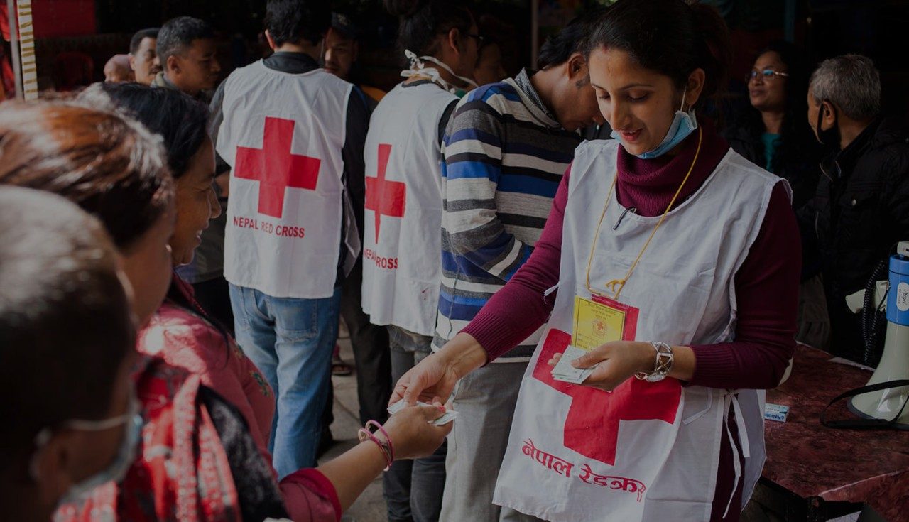 International Services personnel at a community affected by the Nepal earthquake.