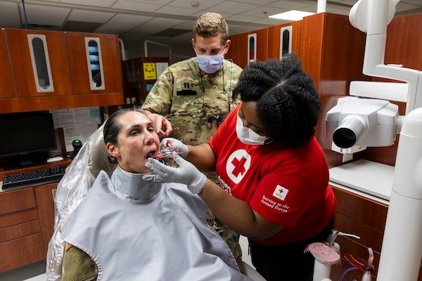 American Red Cross Dental Assistant Training Program student Natasha Stevens-Cintron participate in chairside training in the Allen Dental Clinic at Fort Sill. 