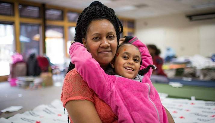 A family at a Red Cross shelther.