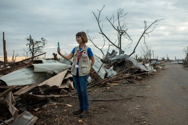 Red Cross volunteer documents tornado damage