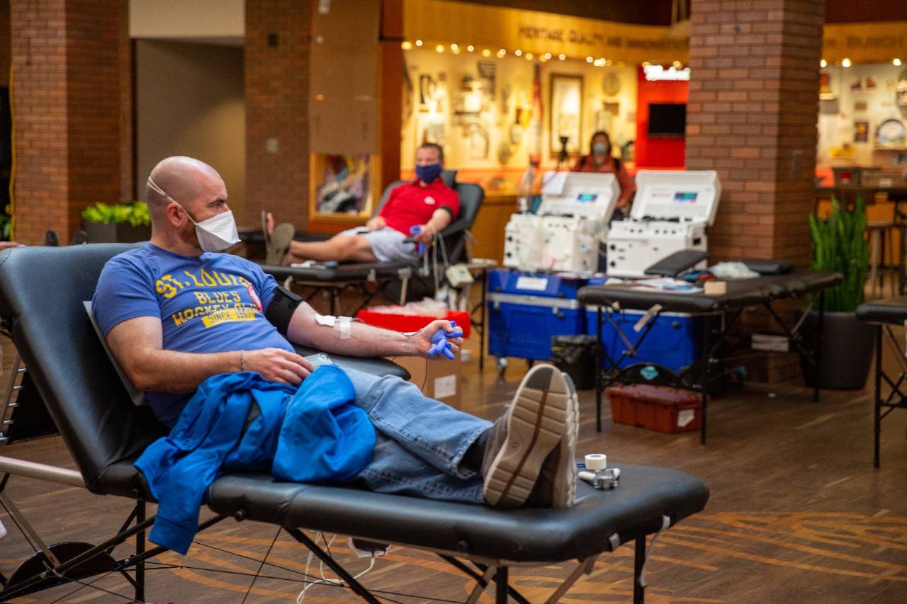 Chris Kerber gives a whole blood donation during a blood drive at the Anheuser-Busch Tour Center in St. Louis.