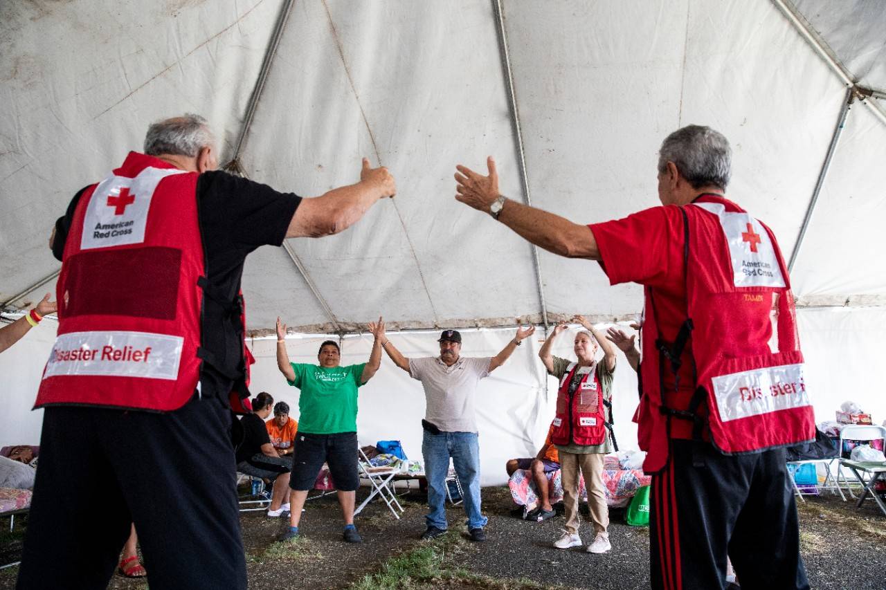 January 19, 2020. Guánica, Puerto Rico.Red Cross volunteers lead a tai chi class that will help residents relieve stress.Photo by Scott Dalton/American Red Cross