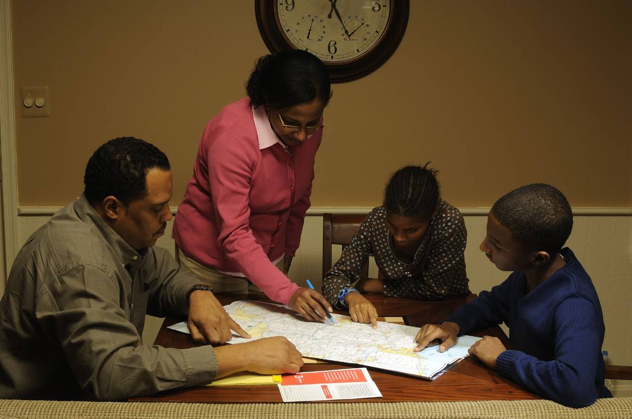 PHSS Preparedness - A family prepares its travel plans.