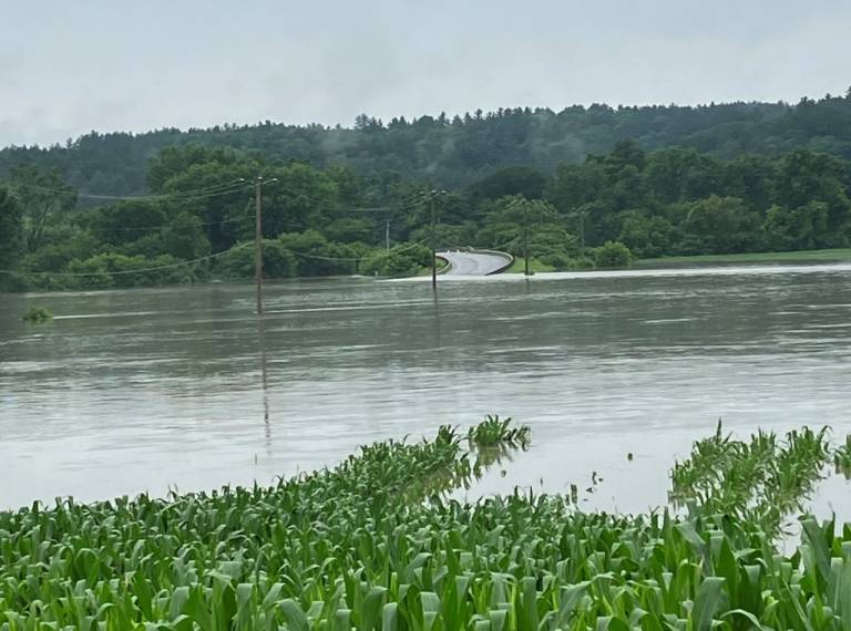 Vermont, floodwaters cut off a roadway. Torrential rains are causing catastrophic flooding across the region.