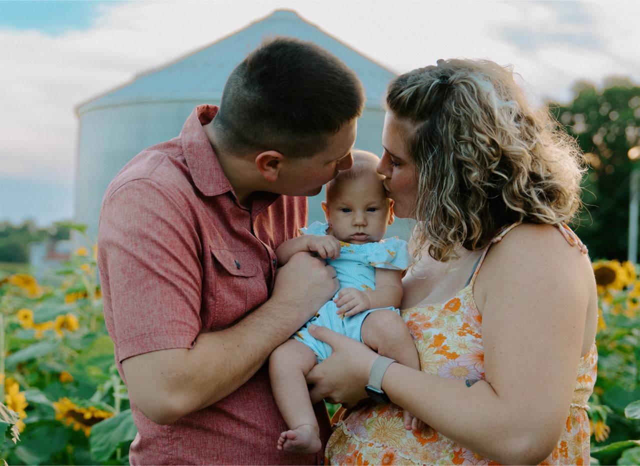 Jonathan and Madi King of Shreveport, LA holding their new born baby