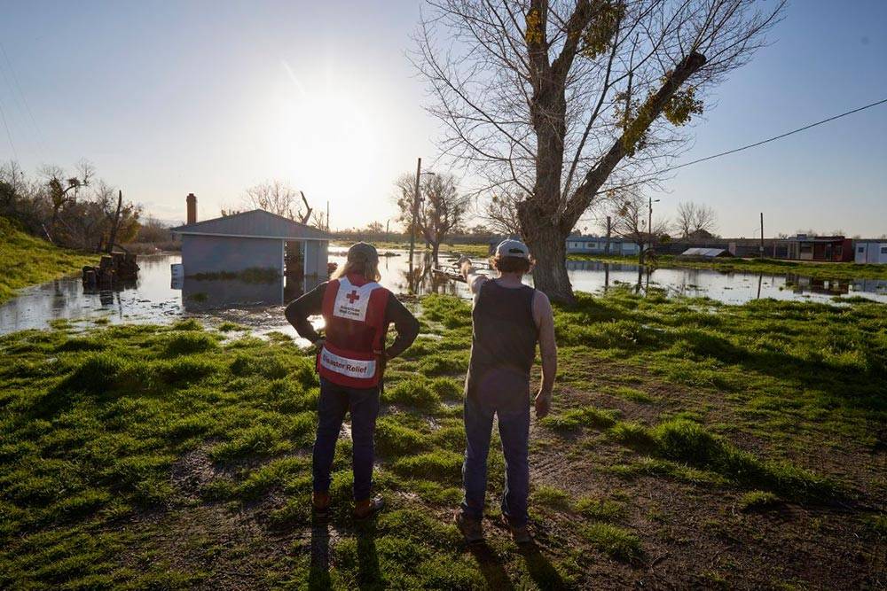 American Red Cross volunteer overlooks damage from the California Atmospheric River