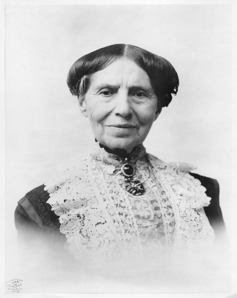 Woman in black and white photo from 1800s