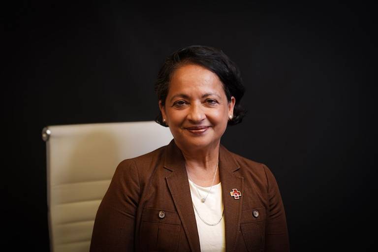 Headshot of Dr. Pampee Young, chief medical and scientific officer for the American Red Cross, wearing a brown blazer.