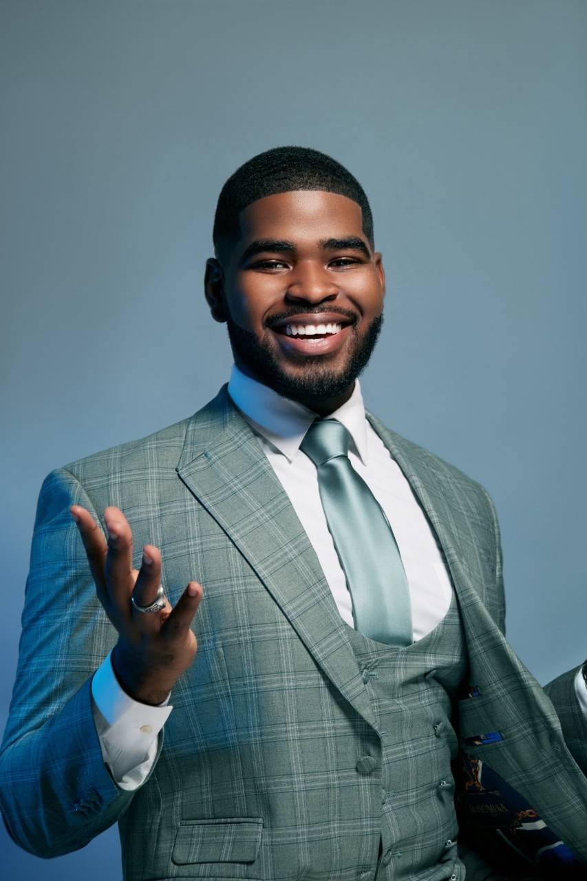 Michael C. Prescot, Jr. wearing a business suit, smiling in a professional photo.