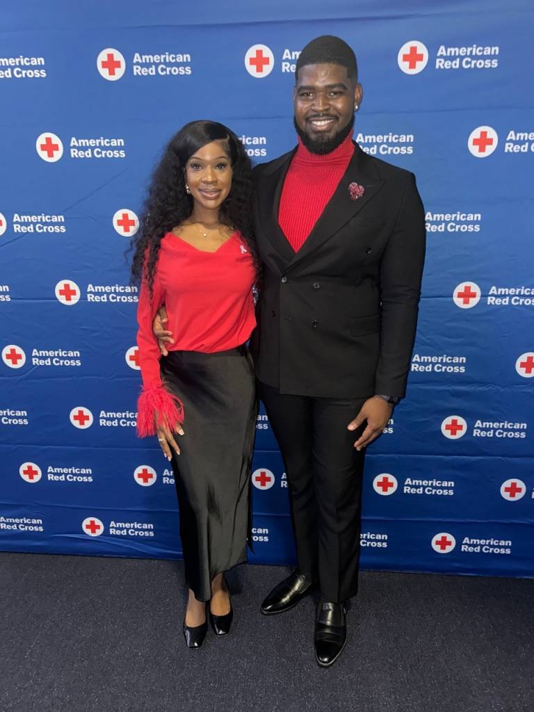 HBCU Ambassadors Monefa Pratt, left, and Michael C. Prescot, Jr. standing together at an American Red Cross HBCU Ambassador Program event.