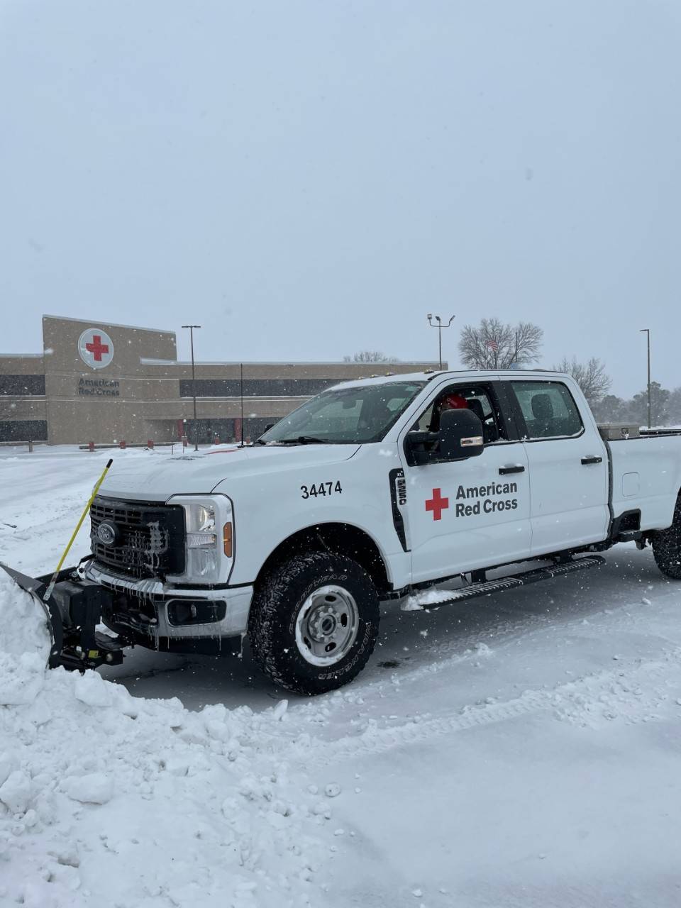 Red Cross pick-up truck with snowplow