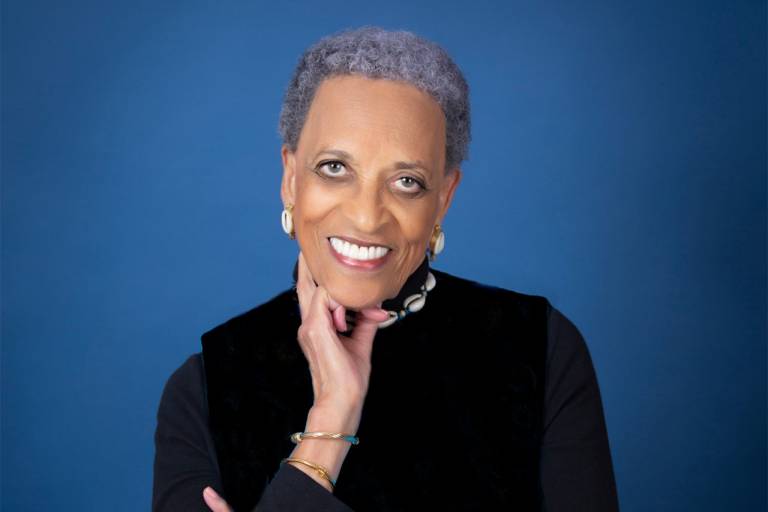 Head shot of woman with white hair