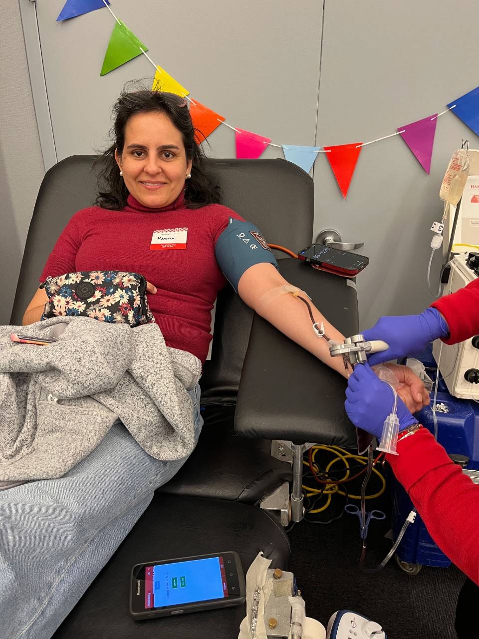Woman on donor bed giving blood