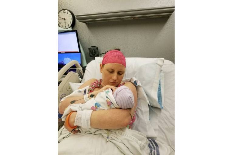 New mom Hannah Gonterman bonds with her son Jennson Leak.