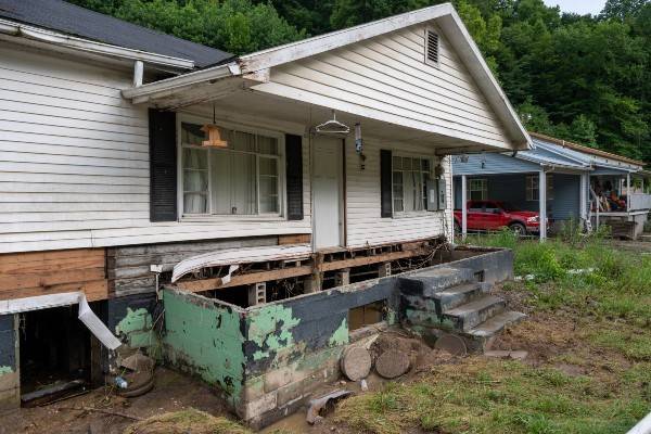 A home with major damage from flooding.
