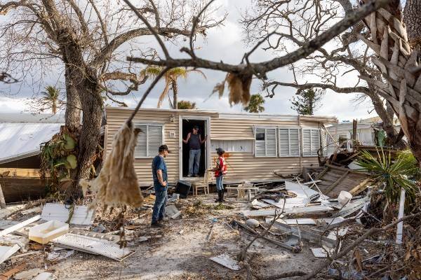 A home with major damage from a disaster.