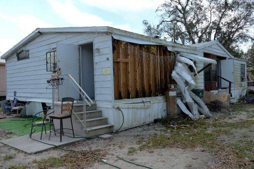 A home that has suffered minor damage to the exterior.