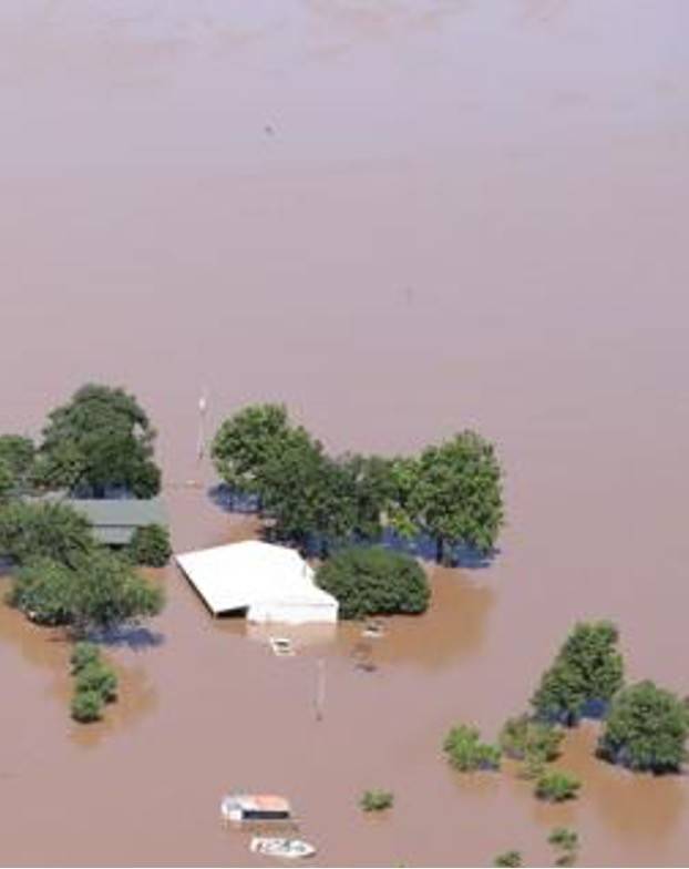 A home that has flooded up to its roofline