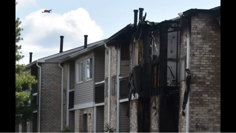 A multi-unit building with major damage from a wildfire
