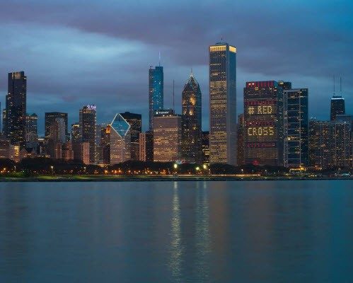 Chicago Skyline buildings spell out Red Cross in their lights