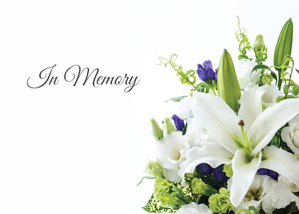 Image of tribute card featuring a bouquet of lilies and the text In Memory