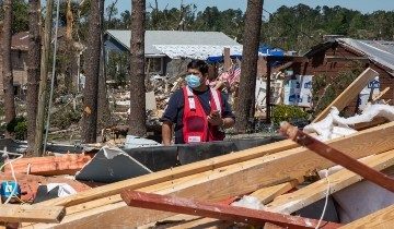 Red Cross volunteer assessing storm damage