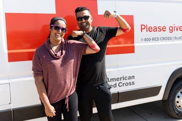People celebrate after donating blood