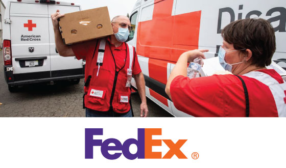 Red Cross volunteers moving supplies above FedEx logo
