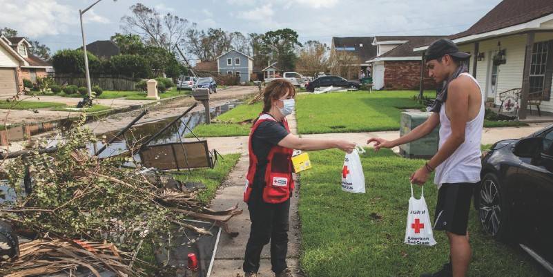 Home Depot Logo + Volunteer with bucket