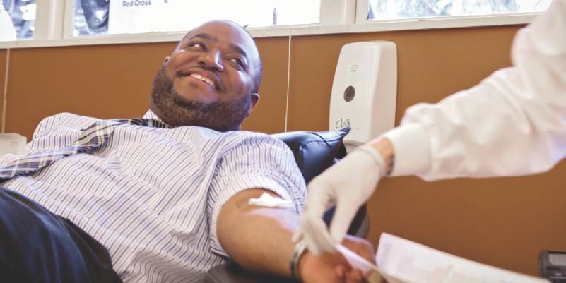 Volunteer giving blood