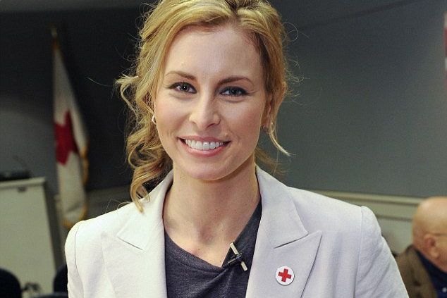 IMAGE DISTRIBUTED FOR AMERICAN RED CROSS - Supermodel Niki Taylor is shown during a surprise reunion and opportunity to thank some of the American Red Cross volunteer blood donors who helped save her life following a 2001 car accident, held Wednesday, March 20, 2013, in Atlanta. The American Red Cross is known for providing humanitarian aid around the world, and  supplies around 40 percent of the nation's blood, relying on volunteers and the generosity of the American public to perform its mission. (John Amis/AP Images for American Red Cross)