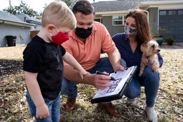 A family reviews their home fire escape plan