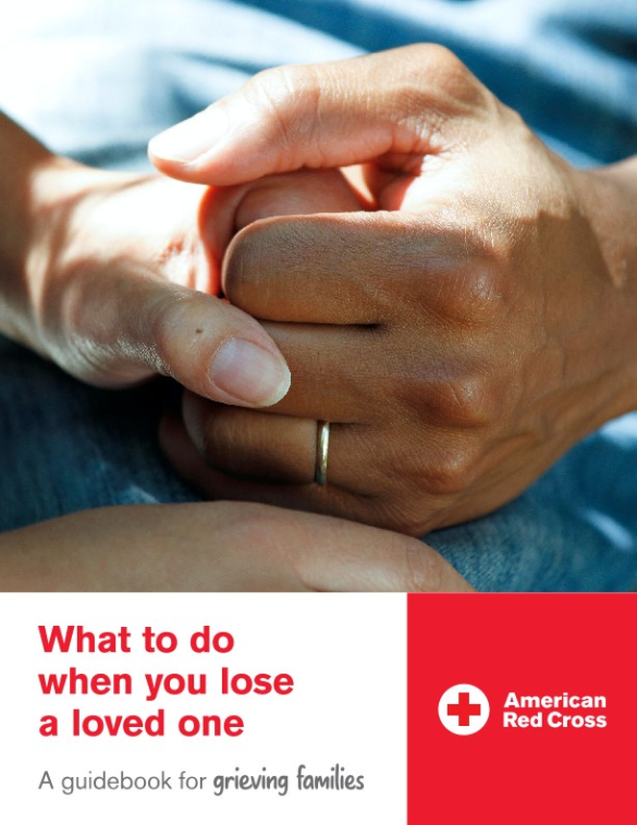 Cover of the guidebook for grieving families from the Red Cross showing a close-up of two people holding hands