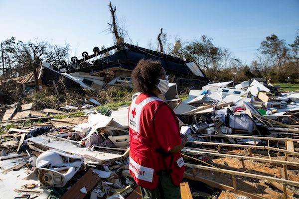 August 27, 2020.  Lake Charles, Louisiana.
American Red Cross volunteer Pam Harris looks at damage caused by Hurricane Laura in Lake Charles, LA on Thursday August 27, 2020.
Photo by Scott Dalton/American Red Cross