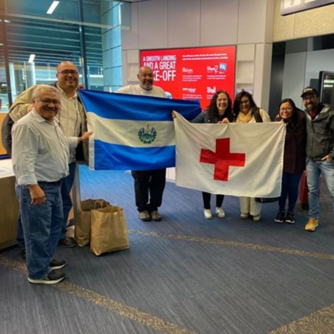 red crossers with salvador and red cross flags