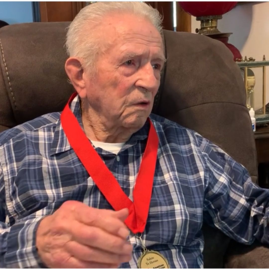 pearson riddle jr with award medal