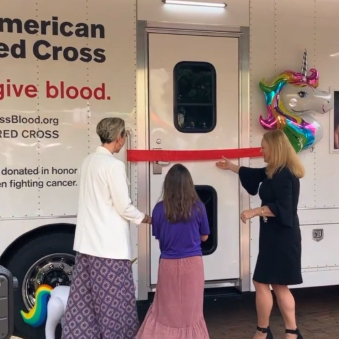 wren at ribbon cutting of blood donation mobile