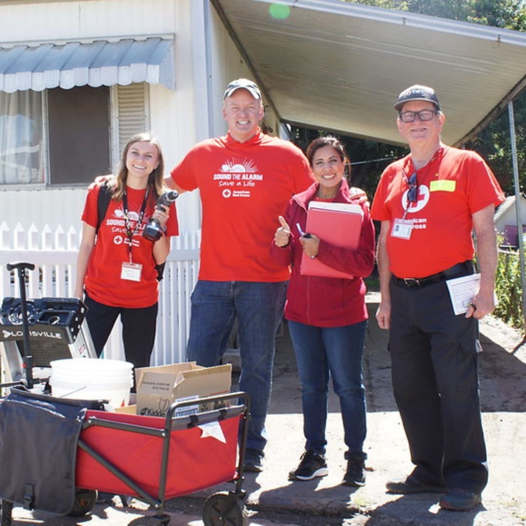 sound the alarm volunteers smiling