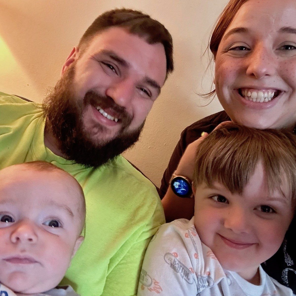 The Lewis family - mother, father and two young children.
