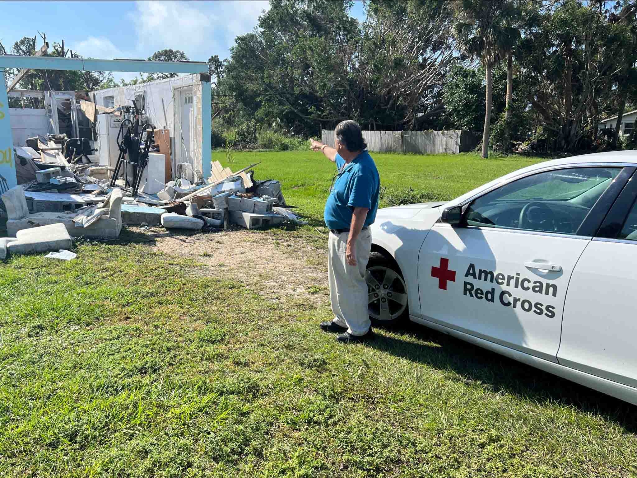 Tony Bombin shows his house damage after Hurricane Ian