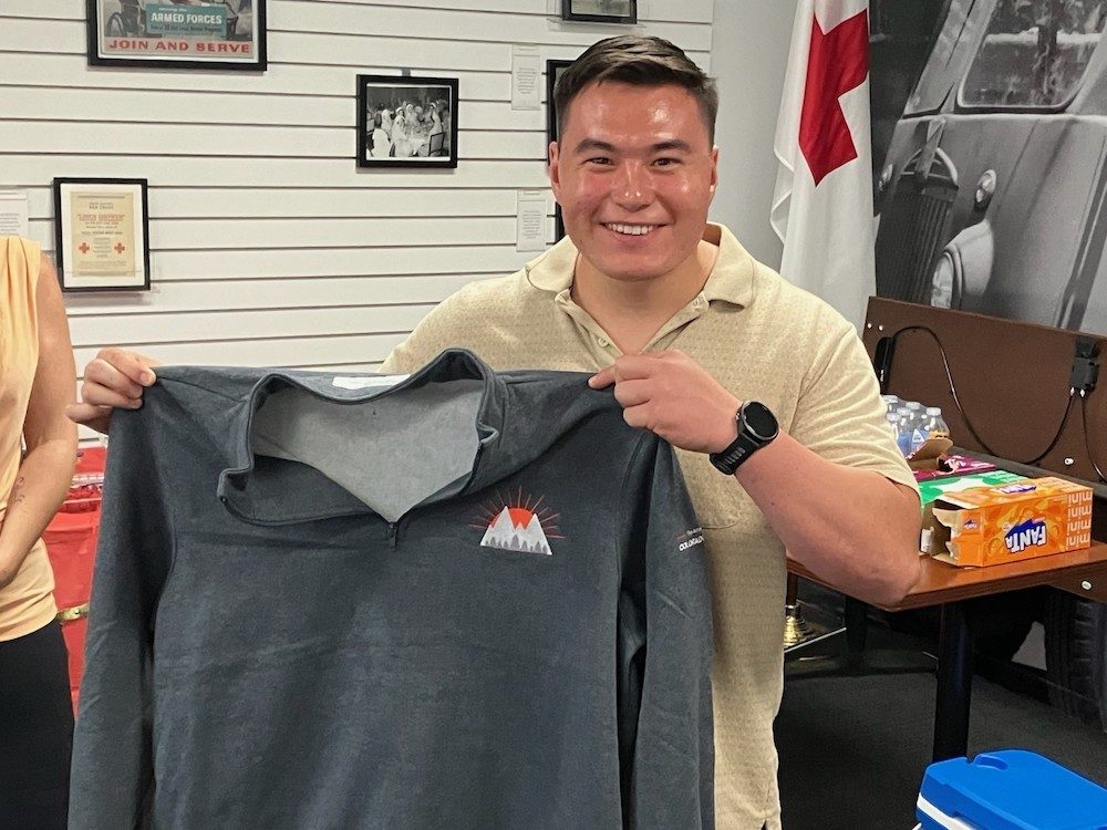 Andrew Yao celebrates before leaving on deployment